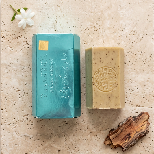 Musk of Paradise Aleppo Soap by Dakka Kadima — two pale green bars displayed on a textured stone slab