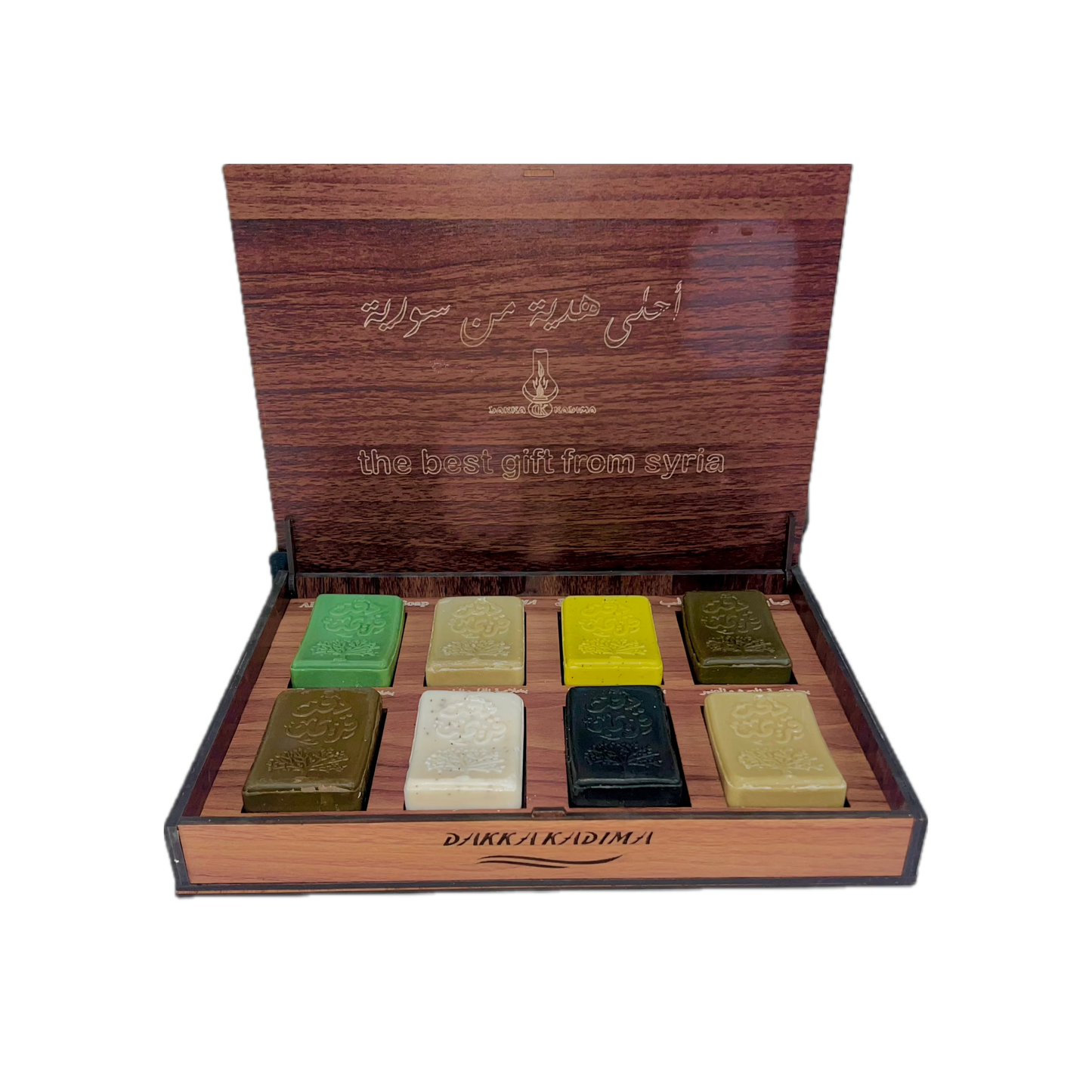 Open wooden gift box showing eight Aleppo soaps by Dakka Kadima | علبة خشبية مفتوحة تعرض ثمانية أنواع من صابون حلب من دقة قديمة